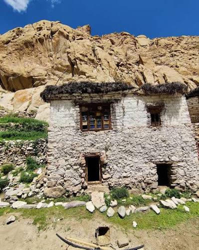 Traditional stone house in Ladakh with flat roof